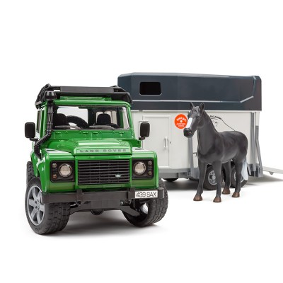 Зелёный внедорожник Bruder Land Rover Defender c коневозкой и лошадкой